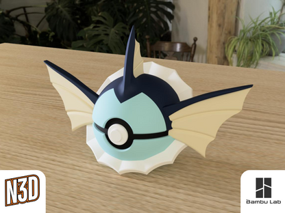 A 3D-printed Pokemon ball that looks like the Vaporeon Pokemon. Designed by N3D and printed in Ireland by 3D Marvels. The item cannot open. It was made in several parts that are held together by friction and little to no glue. It is not a toy or suitable for leaving in a car. It was made using biodegradable and sustainable materials.