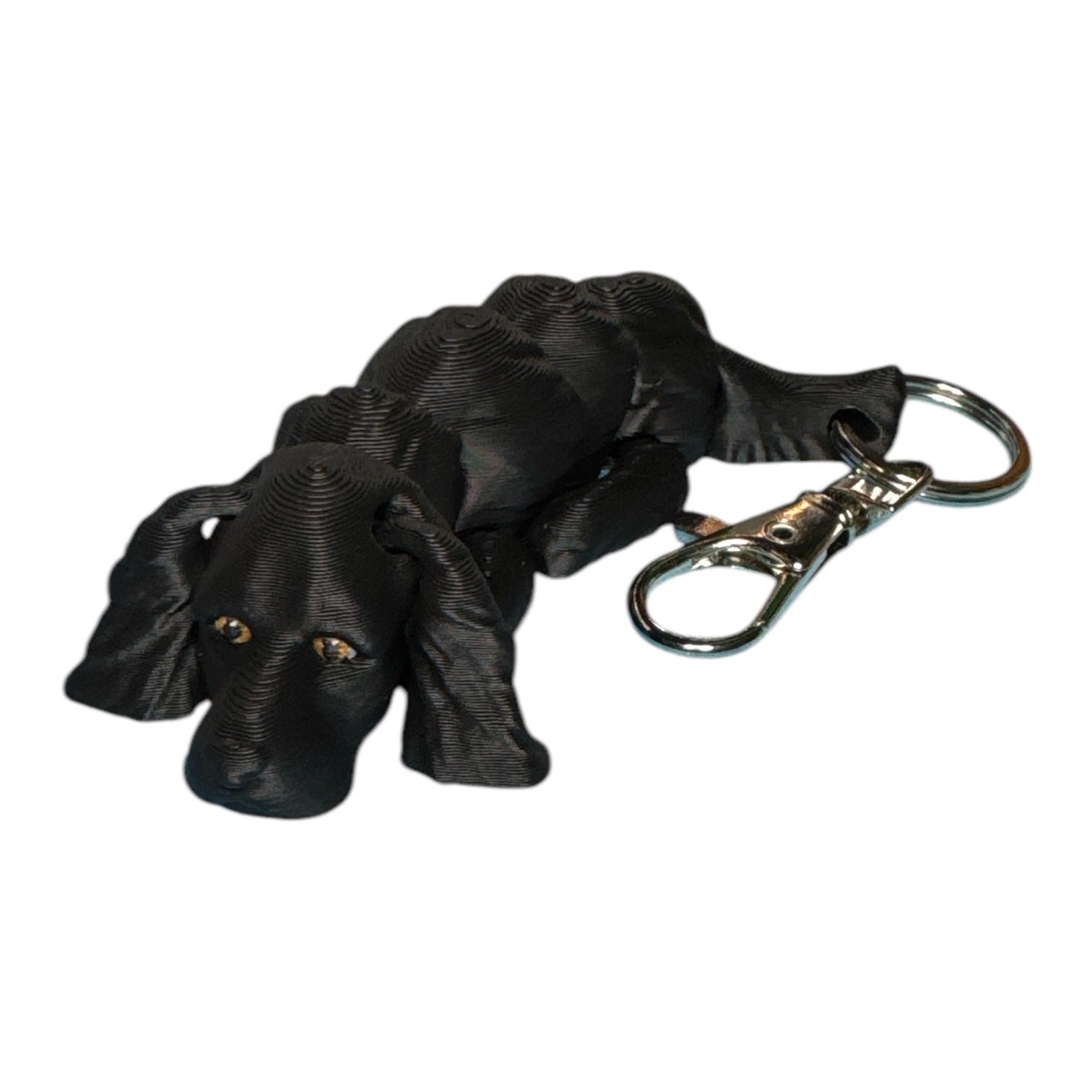 Black articulated cocker spaniel fidget on a keychain 3D printed as one piece designed by kekreations crafted by 3D marvels