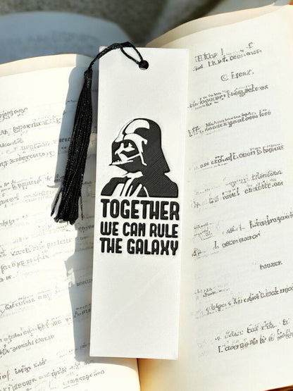 Fan created bookmark inspired by the Star Wars universe.
Top reads: "Together We Can Rule The Galaxy"
Darth Vader depicted on top of the quote


3D Printed and coloured by 3D Marvels, designed by Mysstra hueforge 3Dart

*Ribbon colour is random for each item