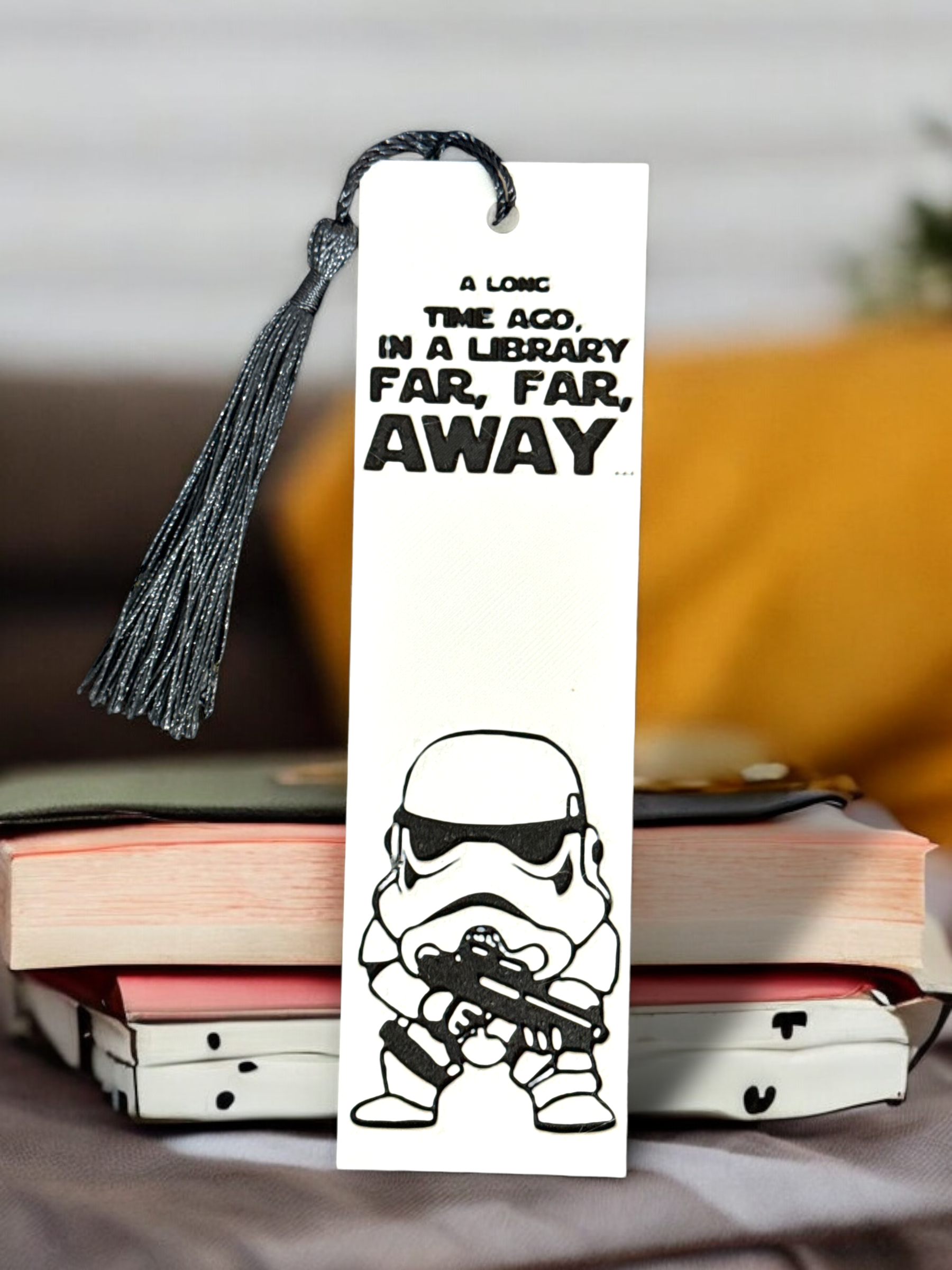 Fan created bookmark inspired by the Star Wars universe.
Top reads: "A Long Time Ago In A Library Far Far Away Bookmark"
Big headed storm trooper, holding a gun


3D Printed and coloured by 3D Marvels, designed by Mysstra hueforge 3Dart