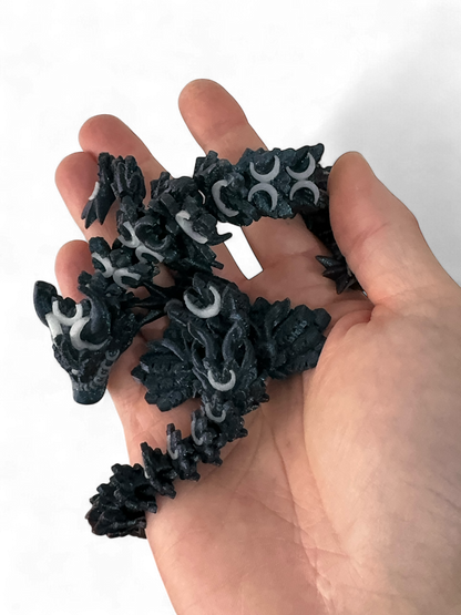 3D Printed Lunar Dragon desk toy fidget dragon held and wrapped around hand