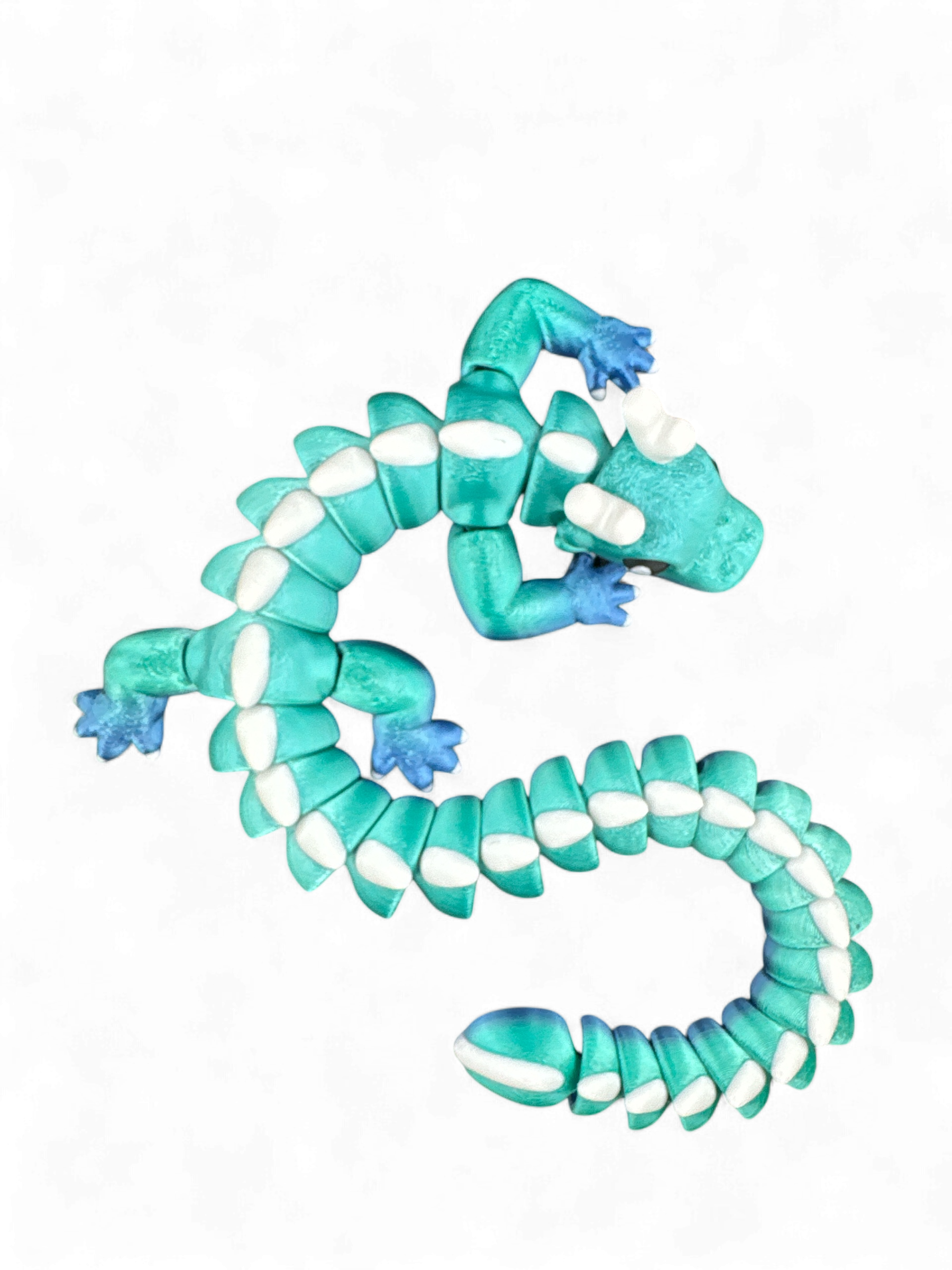 blue green cute dragon as 3d-printed collectible fidget toy by Zou3D and 3D Marvels