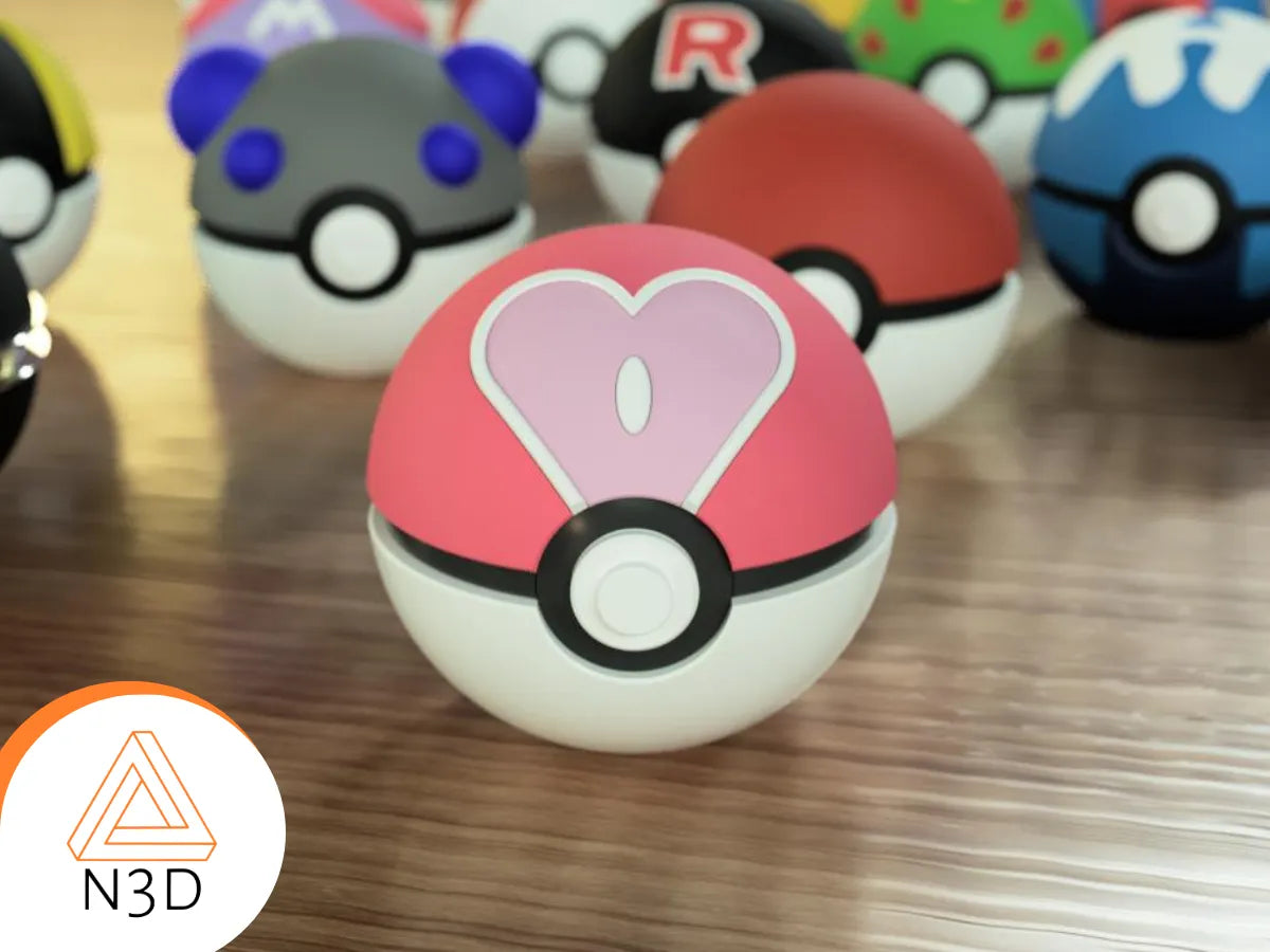 This is a 3D-printed Pokemon ball that looks like the Love Ball. It was designed by N3D and printed in Ireland by 3D Marvels.  It was made in several parts that are held together by friction and little to no glue. It is not a toy or suitable for being left in a hot car. It was made using biodegradable and sustainable PLA material.